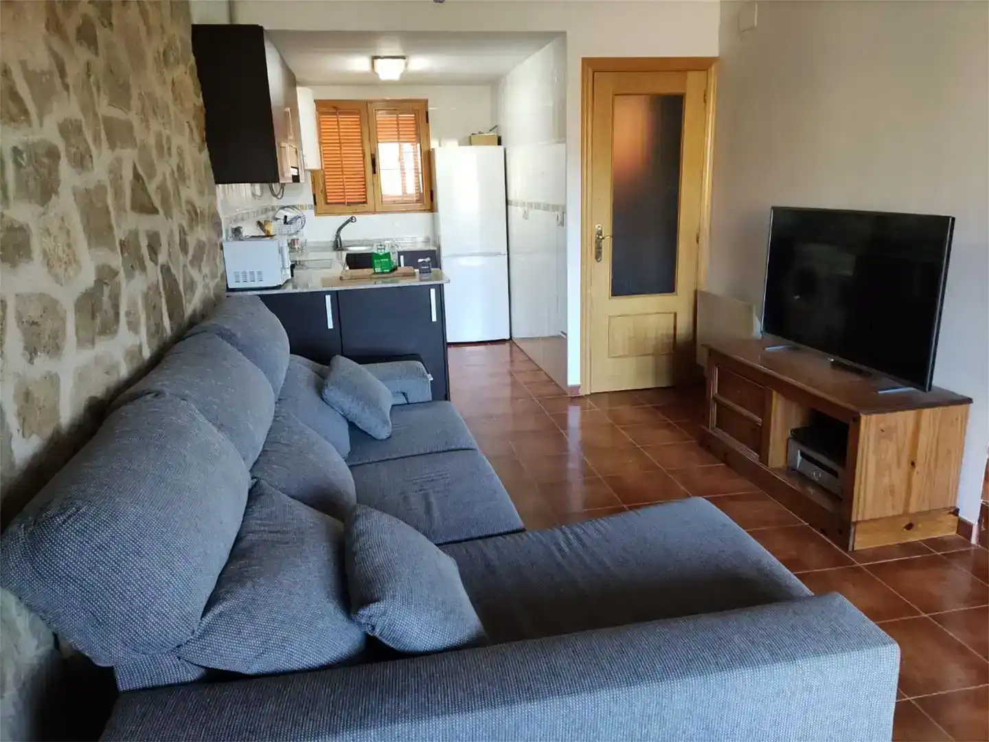 Sala d'estar de Casa o xalet en venda en Alcalá de la Selva amb Traster, Moblat i Forn