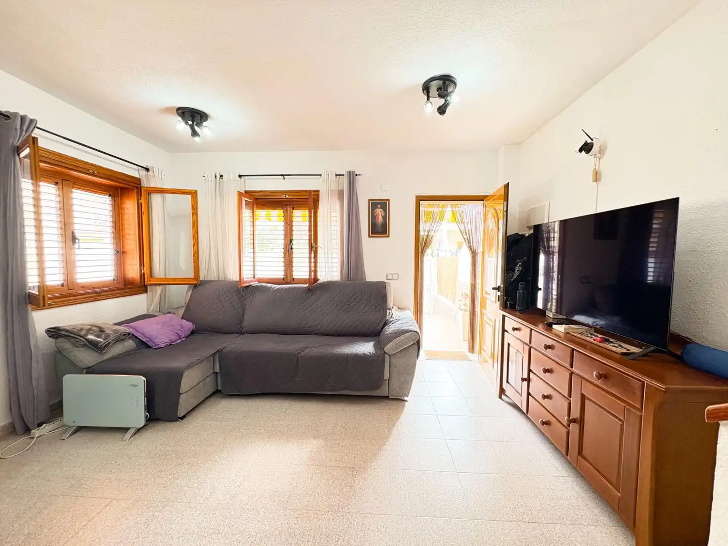Sala d'estar de Casa adosada en venda en Santa Pola amb Terrassa i Piscina comunitària