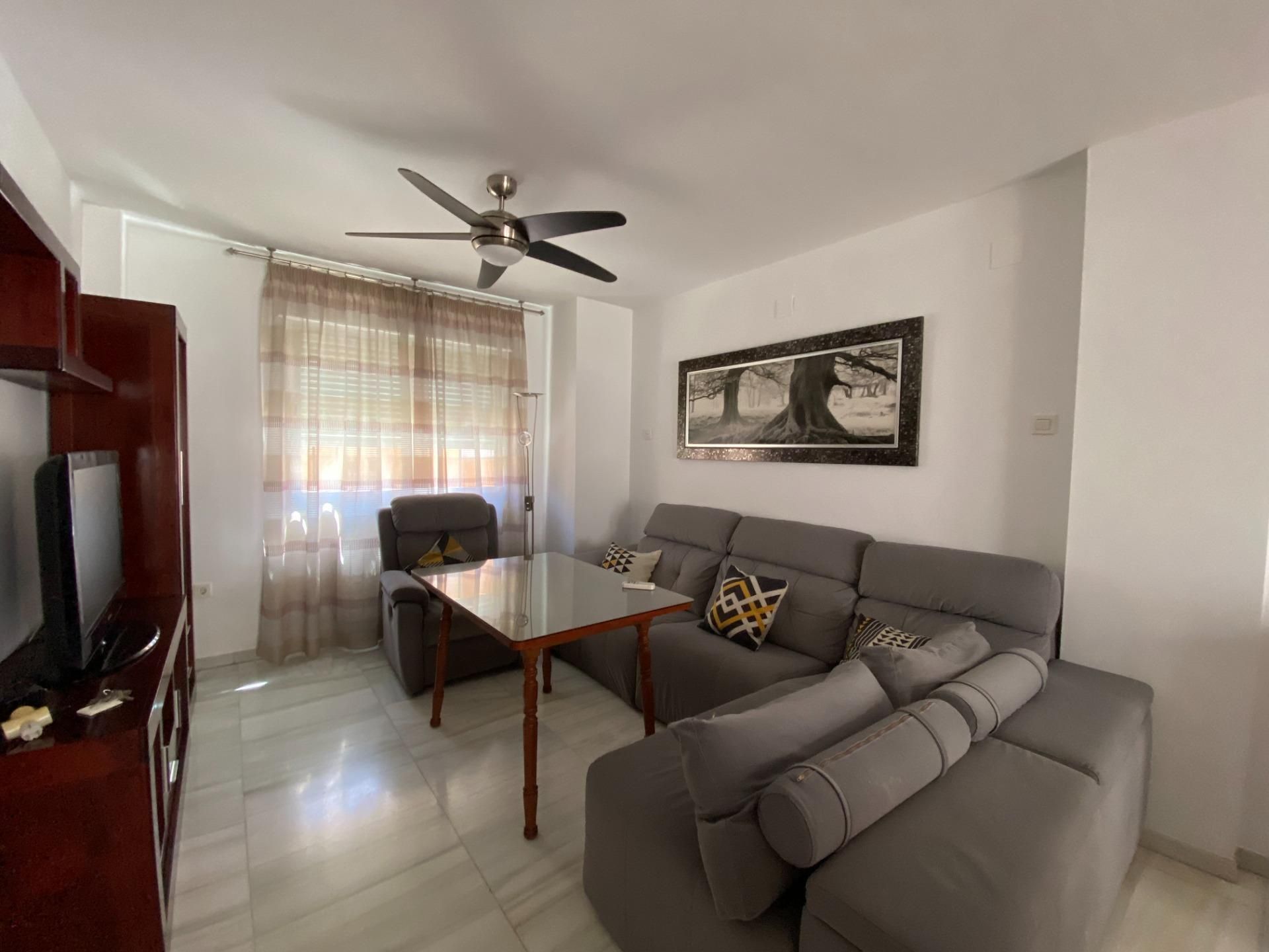 Sala d'estar de Casa adosada de lloguer en Churriana de la Vega amb Calefacció i Balcó