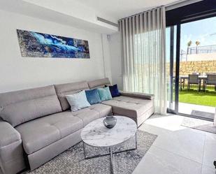 Sala d'estar de Apartament de lloguer en Finestrat amb Aire condicionat, Jardí privat i Terrassa