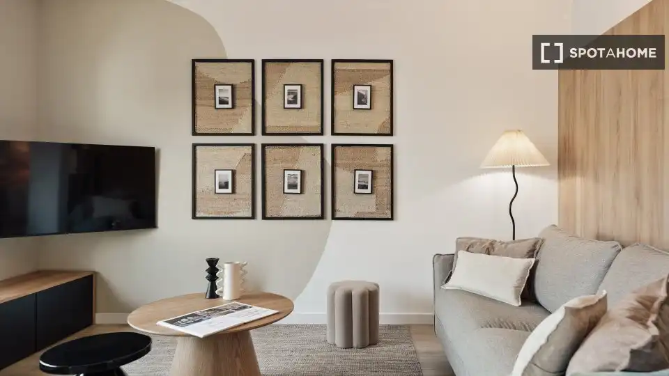 Sala de estar de Apartamento para compartir en Barcelona con Aire acondicionado, Terraza y Amueblado