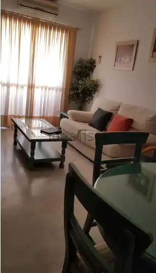Sala d'estar de Pis de lloguer en Sevilla amb Aire condicionat, Terrassa i Moblat
