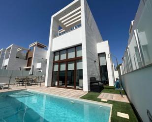 Exterior view of House or chalet for sale in Torrevieja  with Air Conditioner