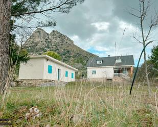 Exterior view of House or chalet for sale in La Cabrera  with Private garden, Terrace and Storage room