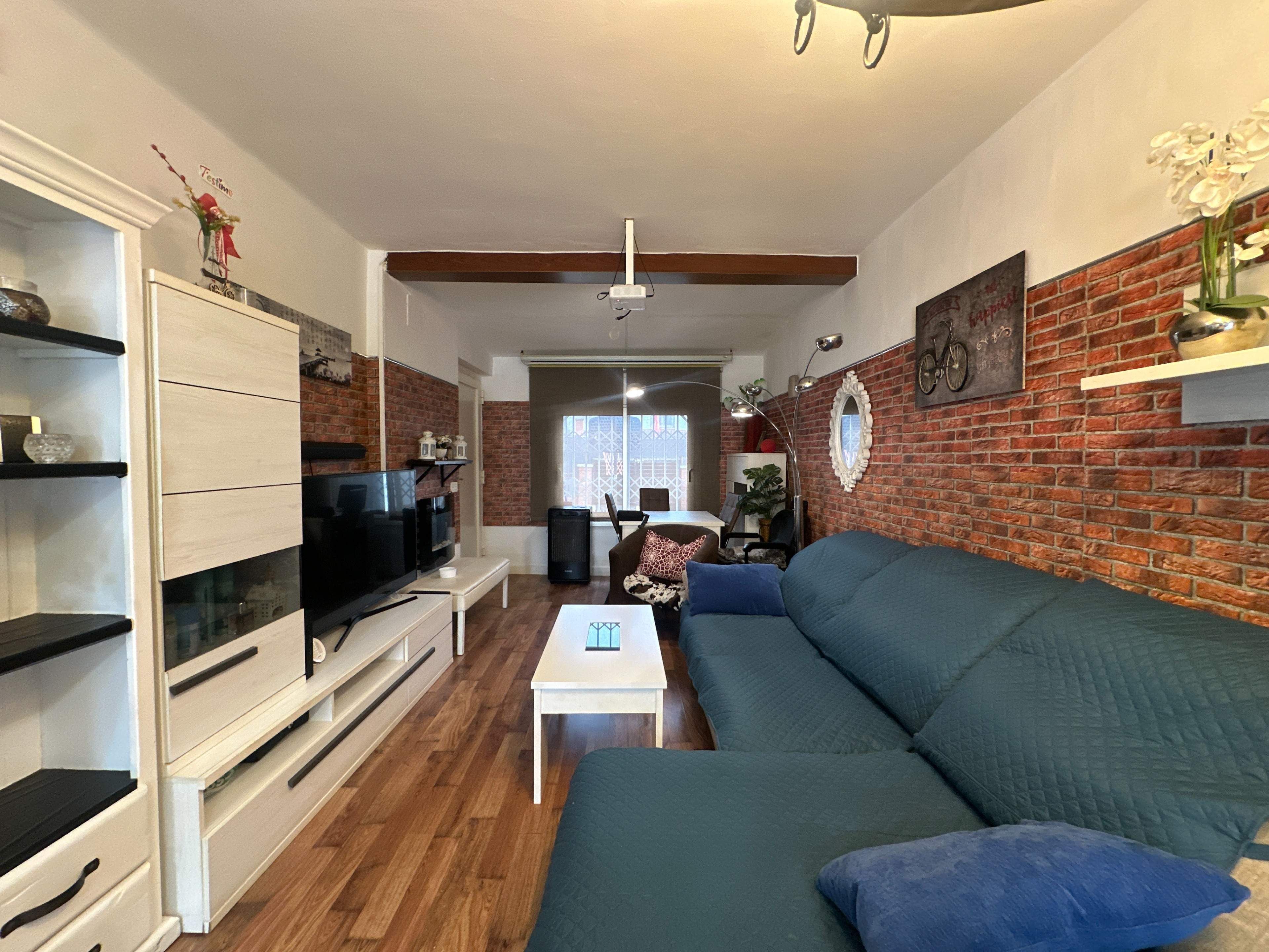 Sala de estar de Casa adosada en venta en Esparreguera