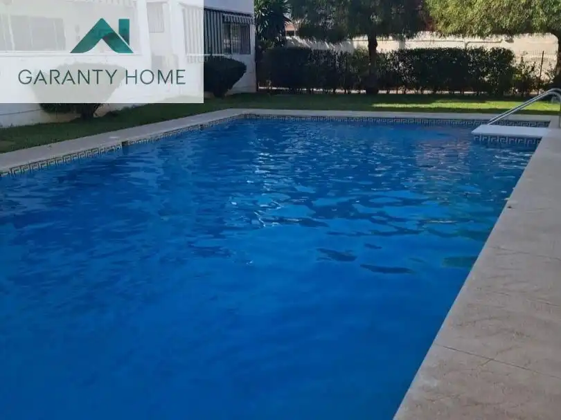 Piscina de Dúplex de lloguer en Torremolinos amb Calefacció, Jardí privat i Terrassa