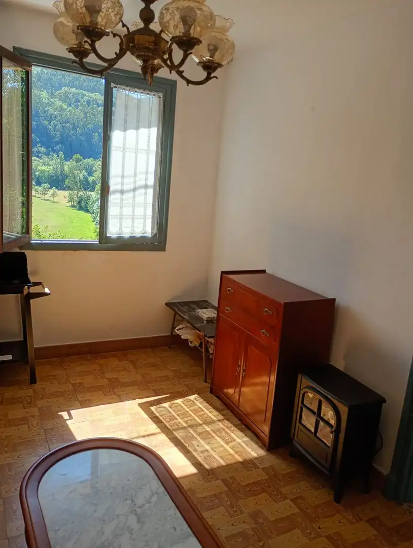 Habitación de Casa adosada en venta en Pravia con Calefacción, Terraza y Trastero