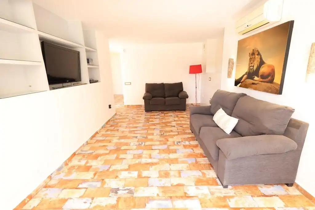 Sala d'estar de Casa o xalet en venda en Orihuela amb Aire condicionat, Jardí privat i Terrassa