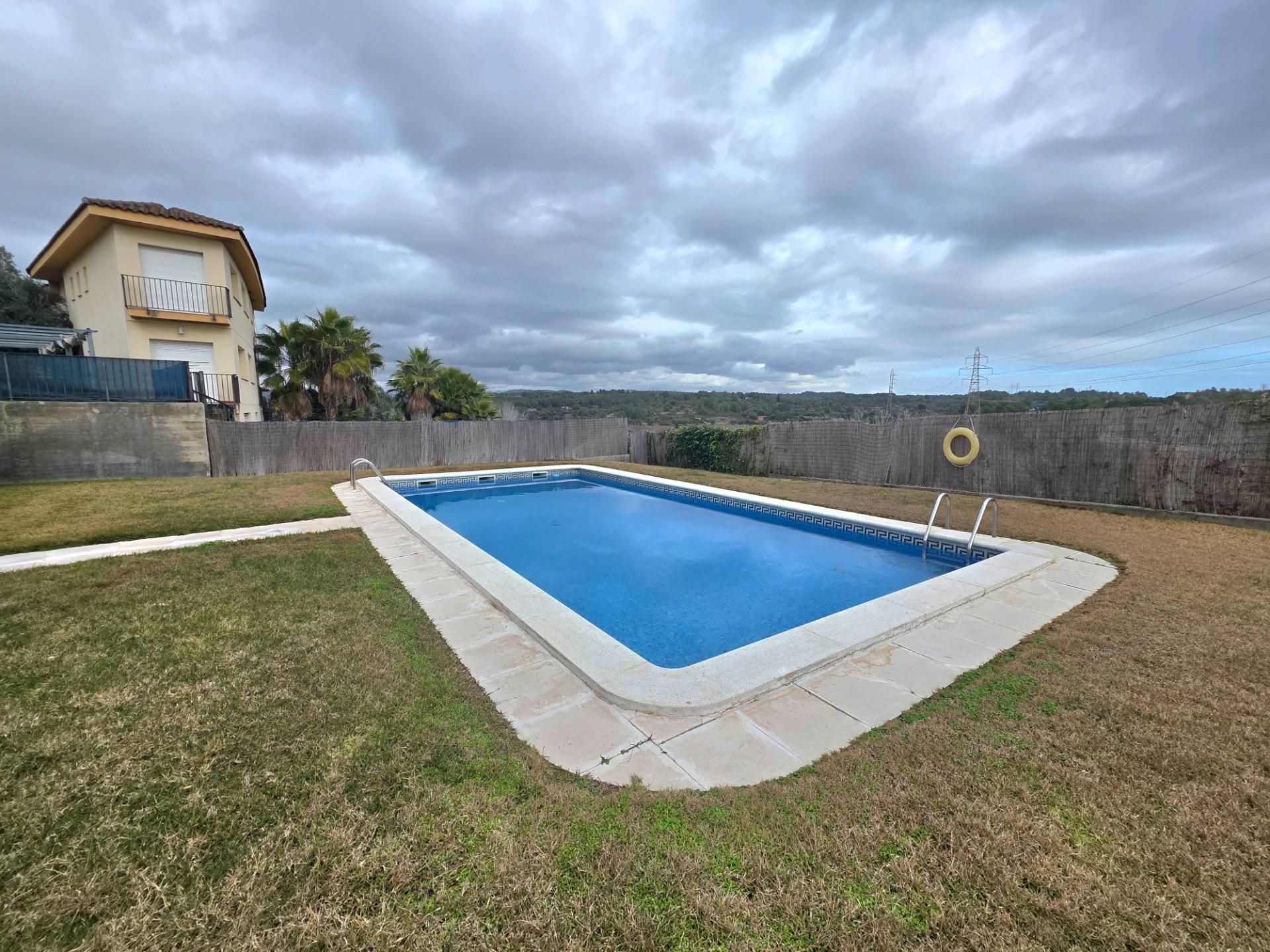 Swimming pool of Single-family semi-detached for sale in La Riera de Gaià  with Air Conditioner, Private garden and Terrace