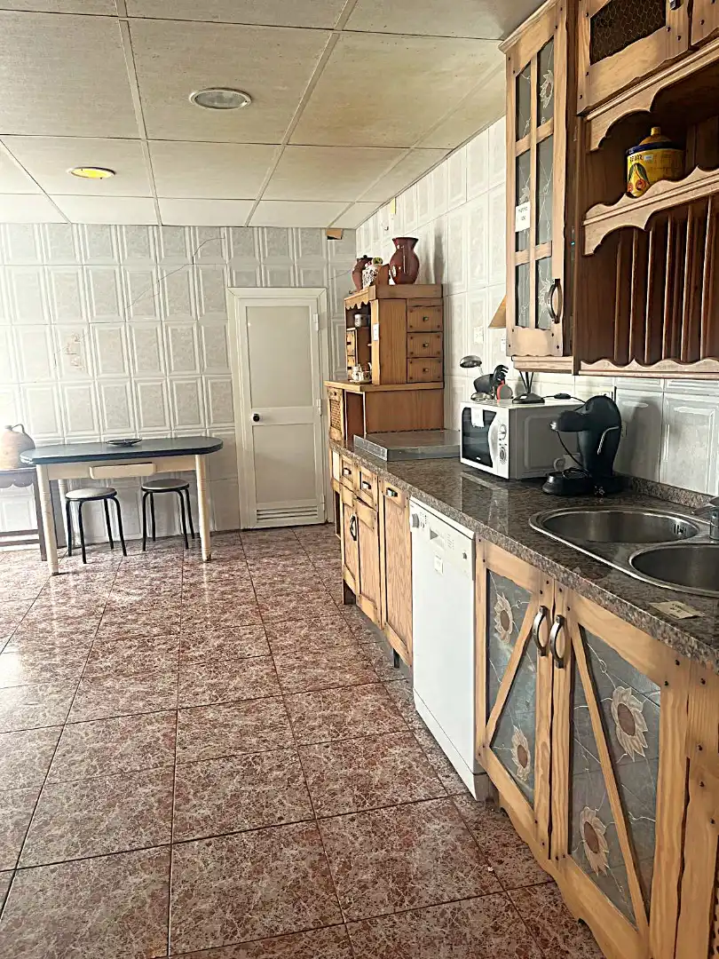 Cuina de Casa o xalet en venda en Vélez-Málaga amb Jardí privat i Terrassa