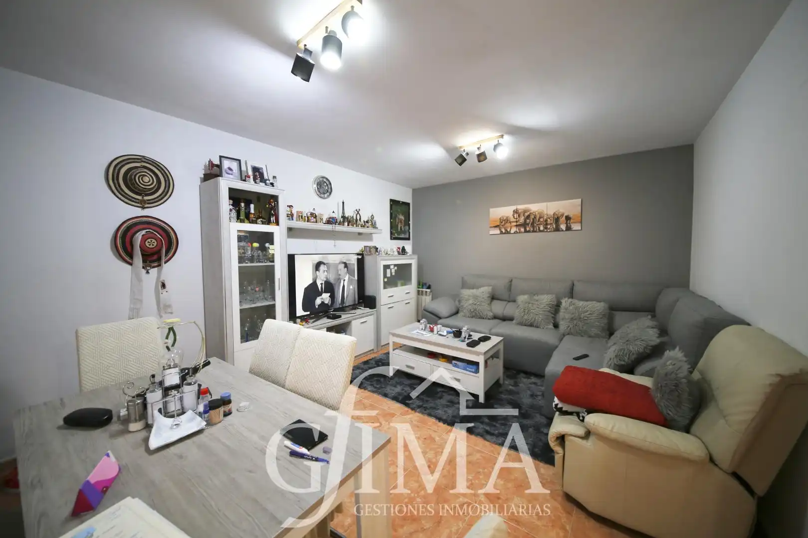 Sala de estar de Casa adosada en venta en Tomelloso con Aire acondicionado, Calefacción y Amueblado