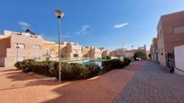 Exterior view of Single-family semi-detached for sale in  Almería Capital  with Terrace and Community pool