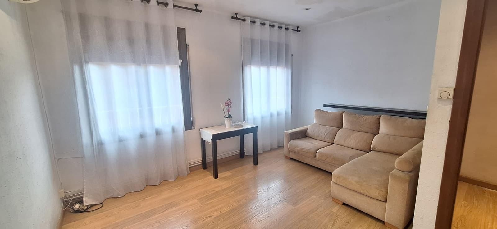 Living room of Flat for sale in Sabadell  with Heating, Parquet flooring and Alarm
