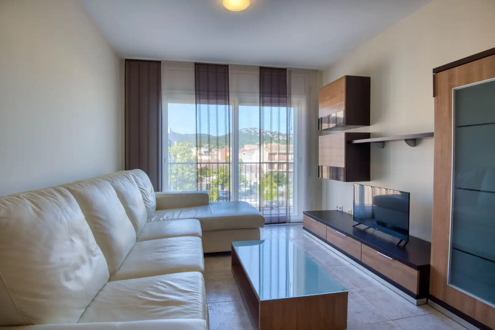 Sala de estar de Piso en venta en Santa Cristina d'Aro con Calefacción, Terraza y Trastero