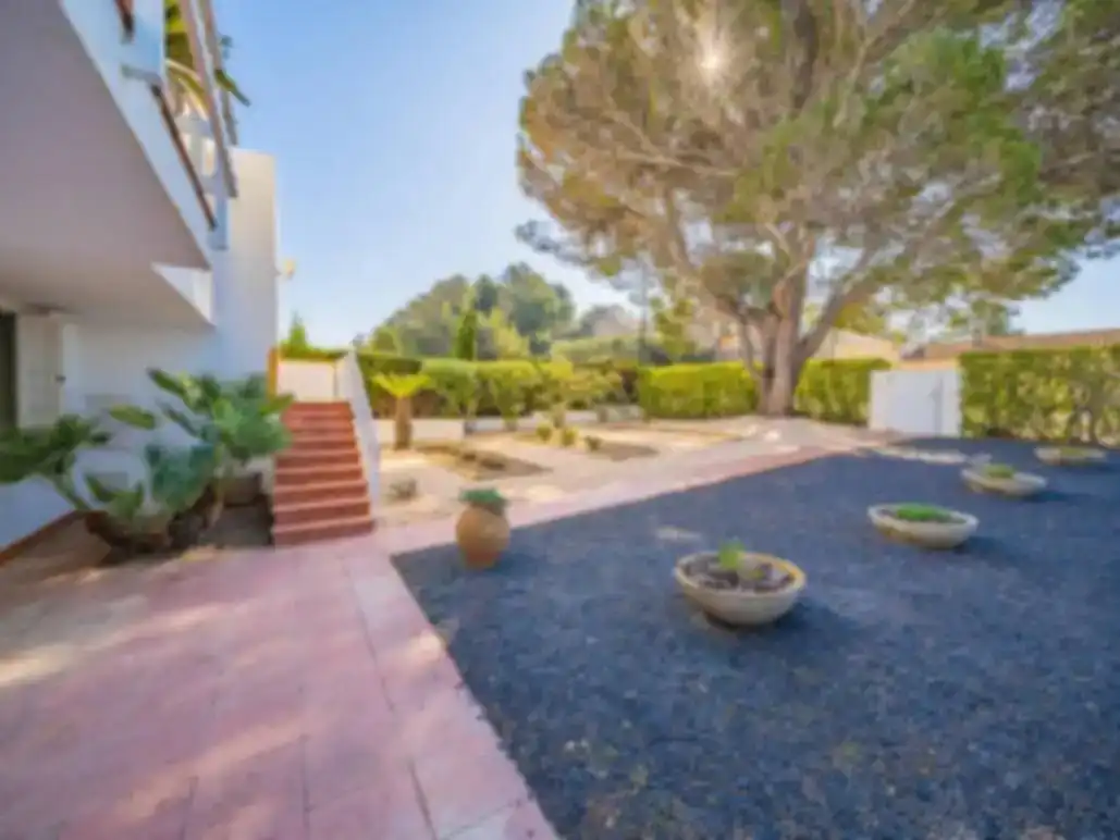 Jardín de Piso de alquiler en L'Escala con Aire acondicionado, Piscina y Amueblado