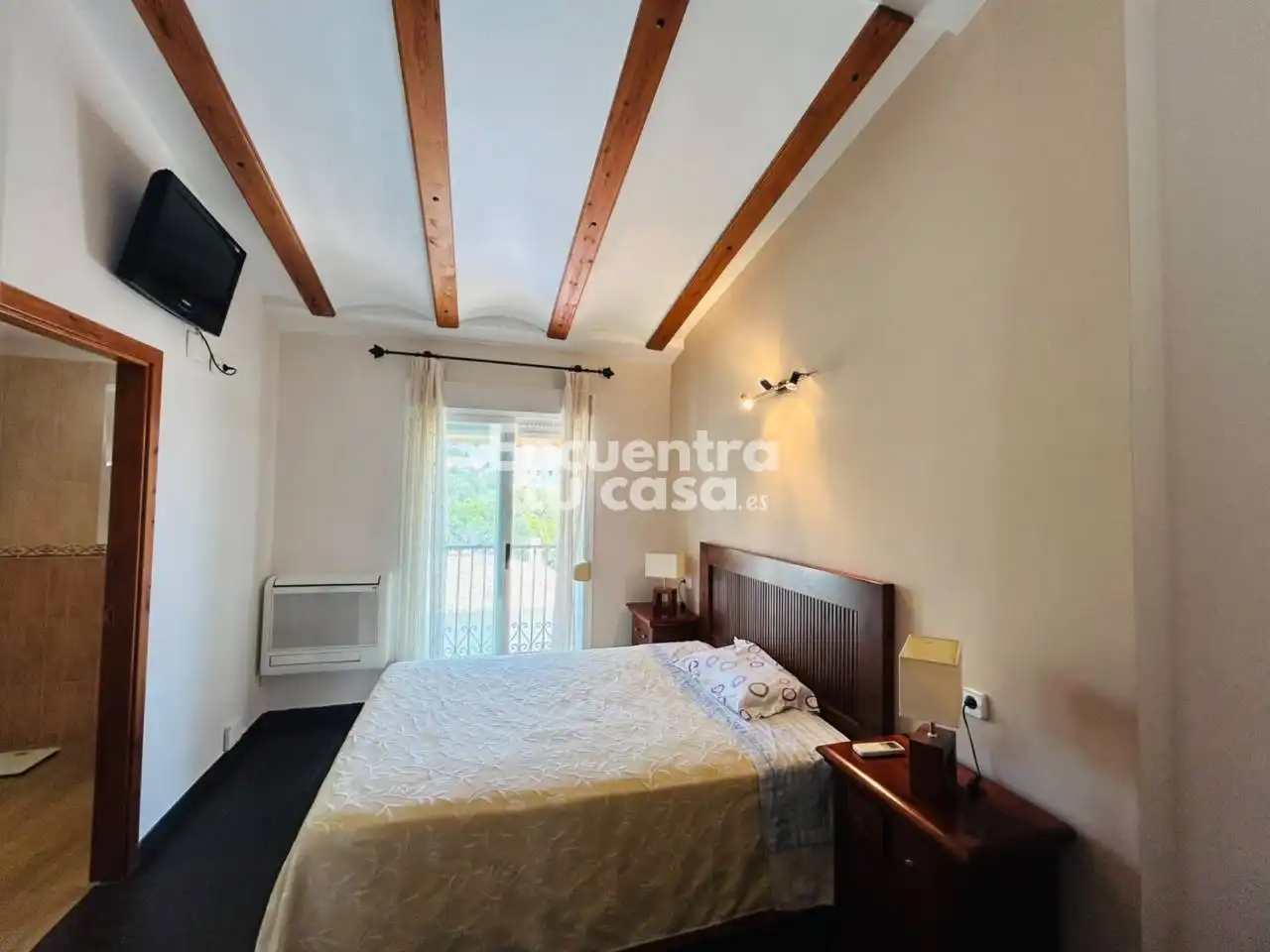 Dormitori de Casa adosada en venda en La Nucia amb Aire condicionat, Calefacció i Jardí privat