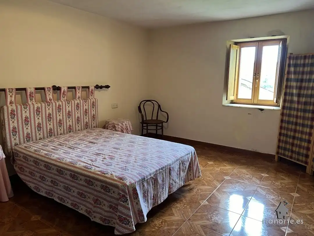 Dormitori de Casa adosada en venda en Ribadesella amb Jardí privat