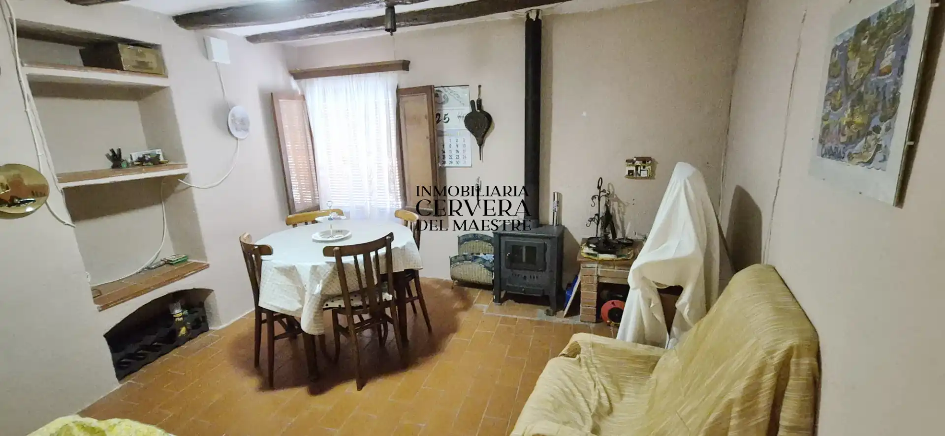 Sala d'estar de Casa adosada en venda en Rossell