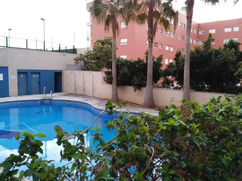 Piscina de Planta baja en venta en Almería con Aire acondicionado, Terraza y Trastero