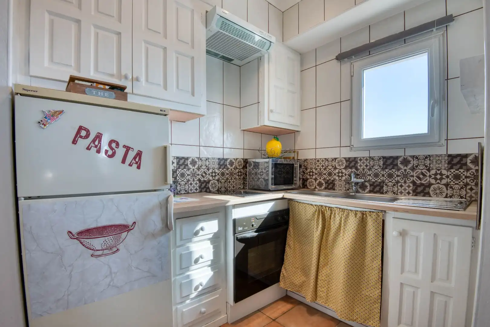 Cocina de Apartamento en venta en L'Escala con Aire acondicionado, Terraza y Amueblado