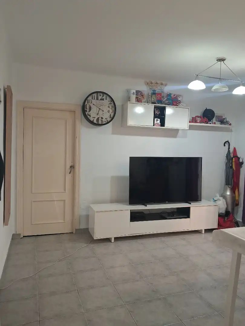 Living room of Flat for sale in San Juan de Aznalfarache  with Air Conditioner, Parquet flooring and Balcony