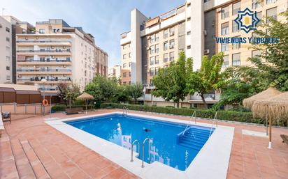 Swimming pool of Flat for sale in  Granada Capital  with Heating, Parquet flooring and Community pool