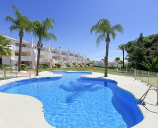 Swimming pool of Planta baja for sale in Mijas  with Air Conditioner, Terrace and Storage room