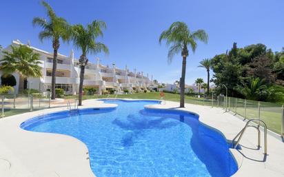 Swimming pool of Planta baja for sale in Mijas  with Air Conditioner, Terrace and Storage room