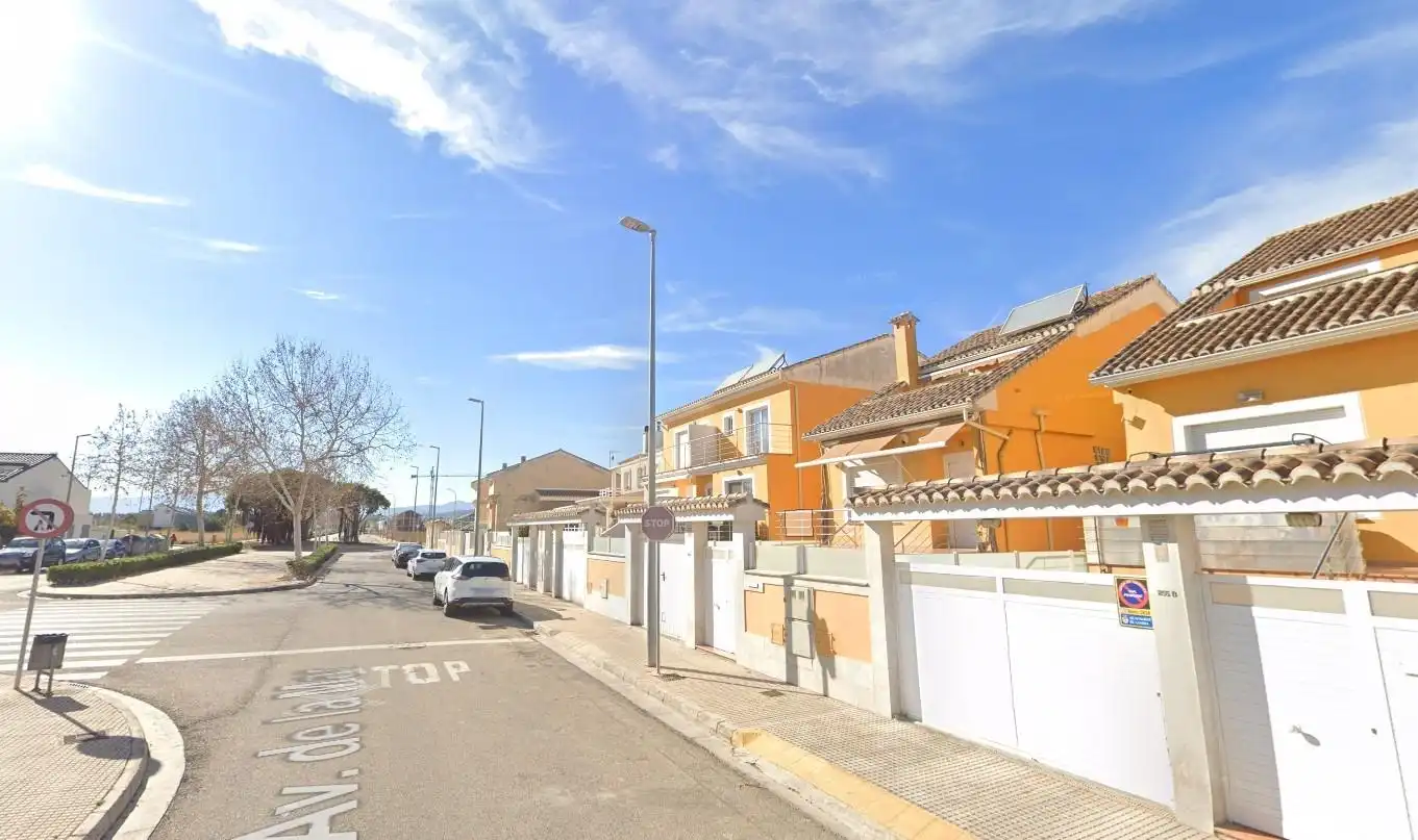 Vista exterior de Casa adosada en venda en Gandia amb Jardí privat, Terrassa i Piscina