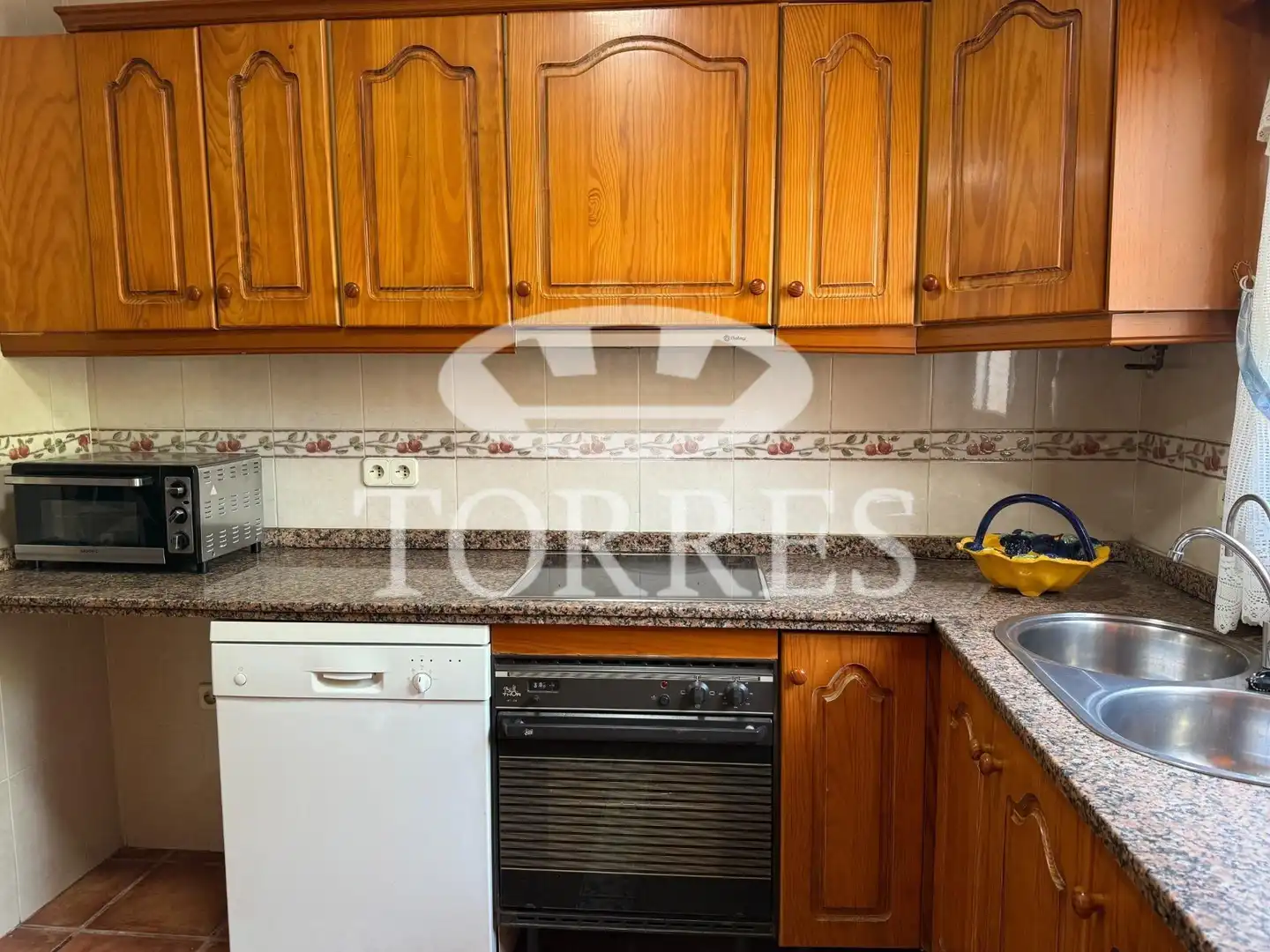 Cocina de Casa adosada en venta en Málaga con Terraza, Balcón y Piscina comunitaria