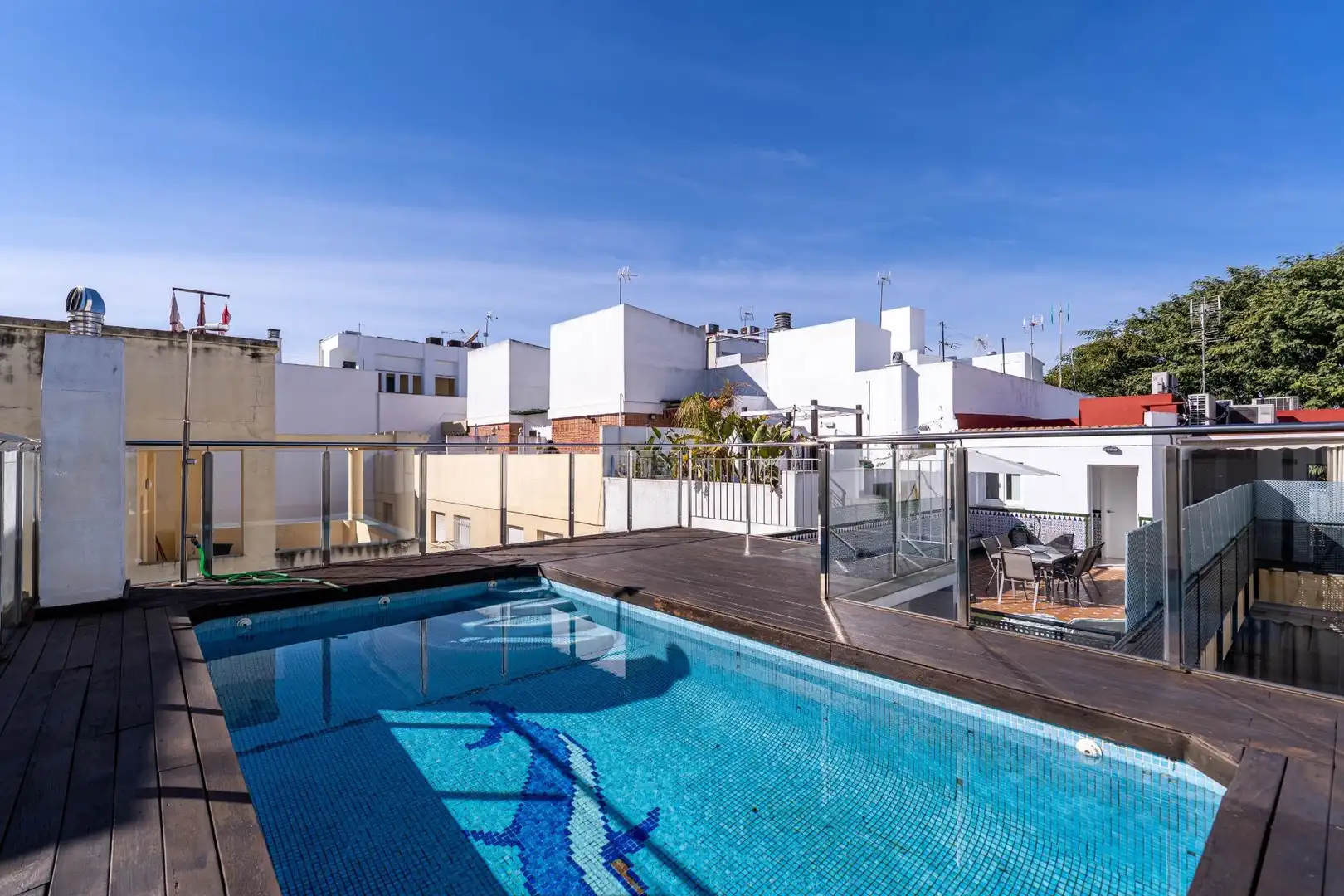 Swimming pool of Attic for sale in  Sevilla Capital  with Air Conditioner, Heating and Terrace