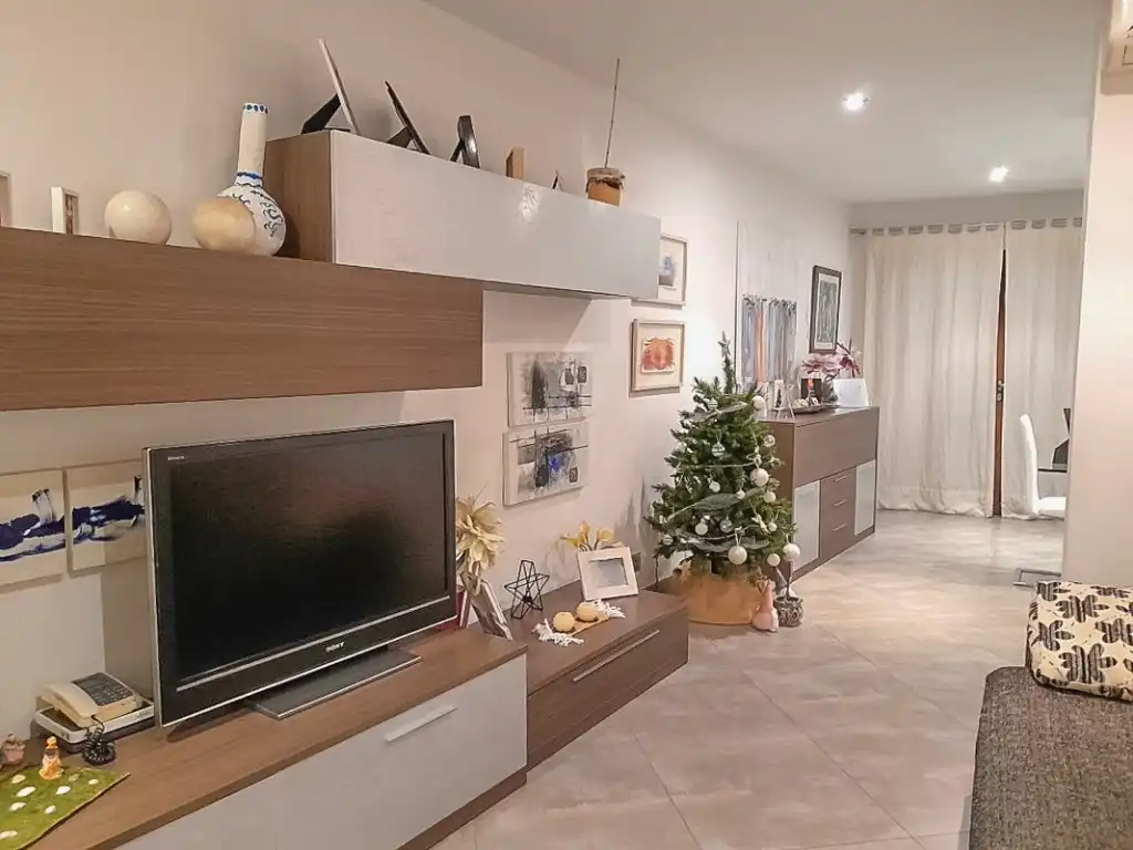Sala d'estar de Casa adosada en venda en Pollença