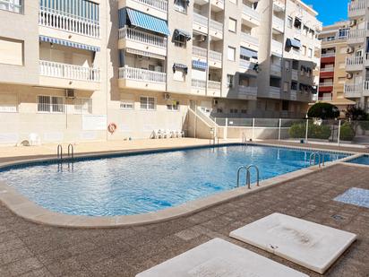 Swimming pool of Flat for sale in Torrevieja  with Air Conditioner