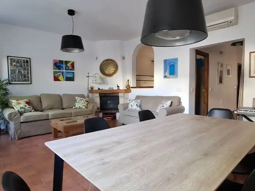Sala d'estar de Casa adosada en venda en Níjar amb Aire condicionat, Piscina i Balcó