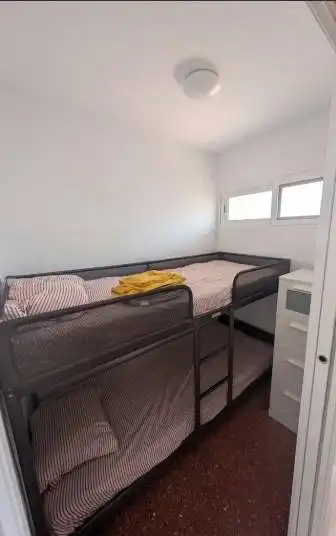 Dormitori de Apartament de lloguer en La Pobla de Farnals amb Aire condicionat, Moblat i Balcó