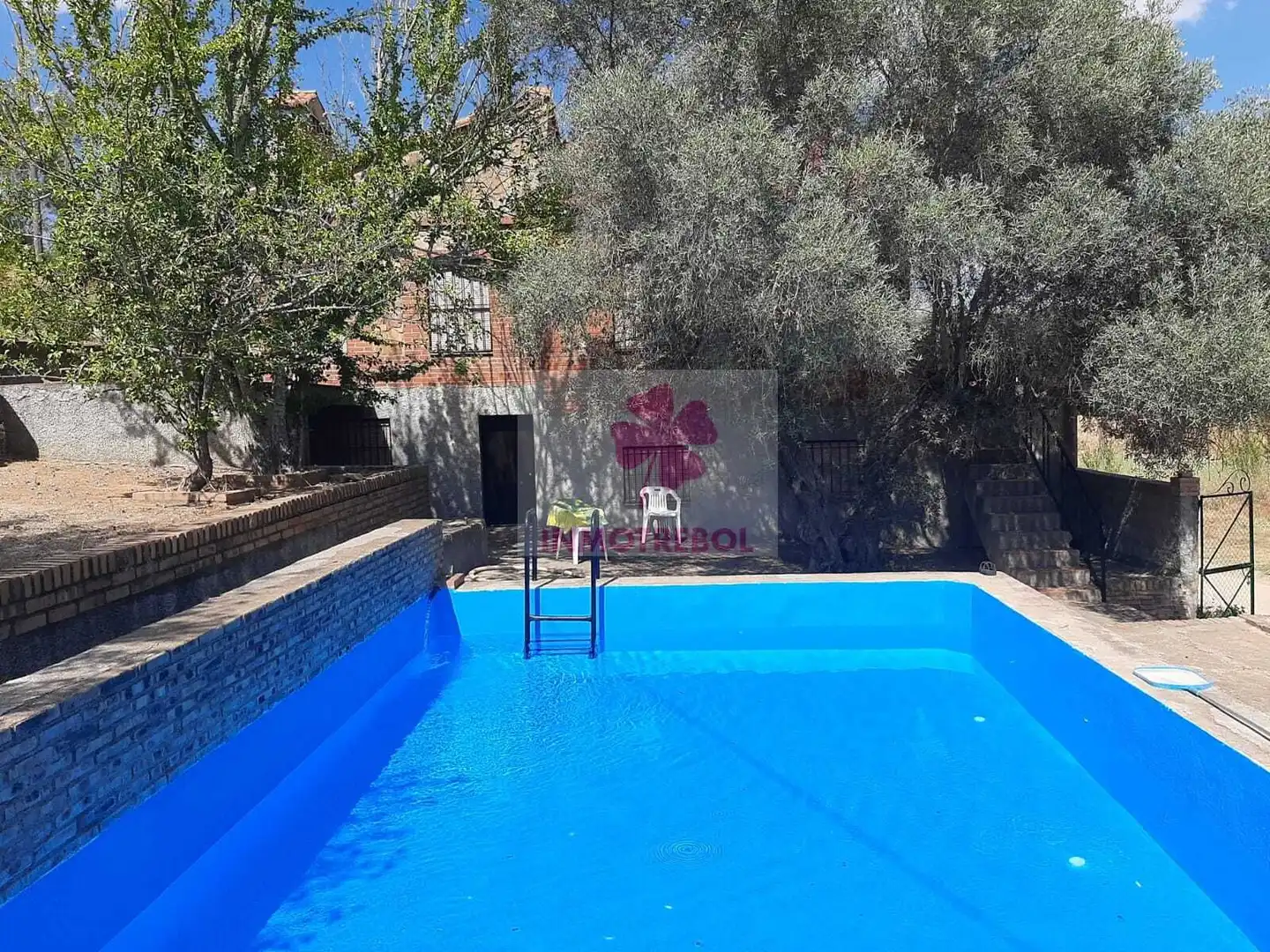 Piscina de Casa o xalet en venda en Alanís amb Jardí privat, Terrassa i Traster