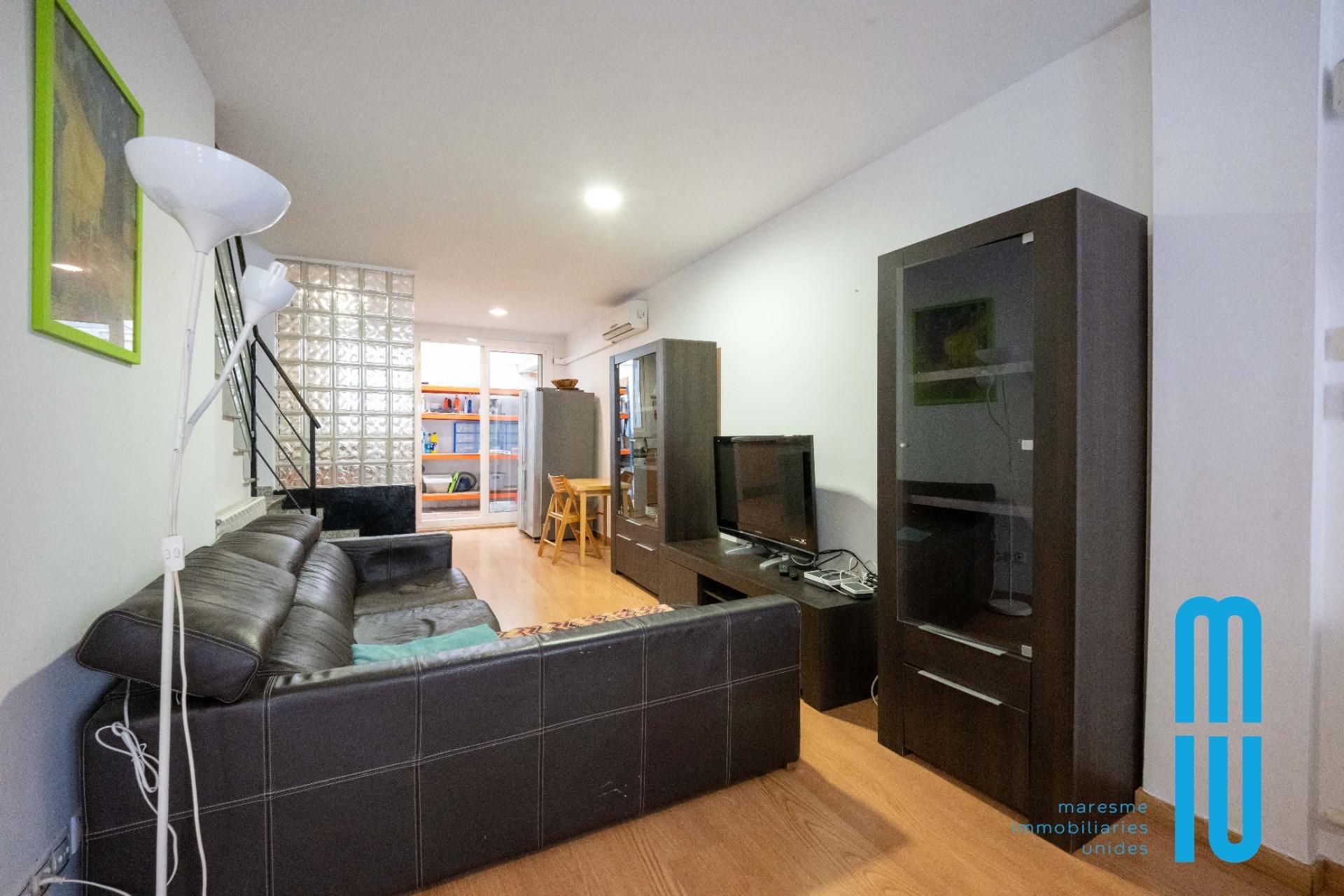 Sala d'estar de Casa o xalet en venda en Badalona amb Calefacció