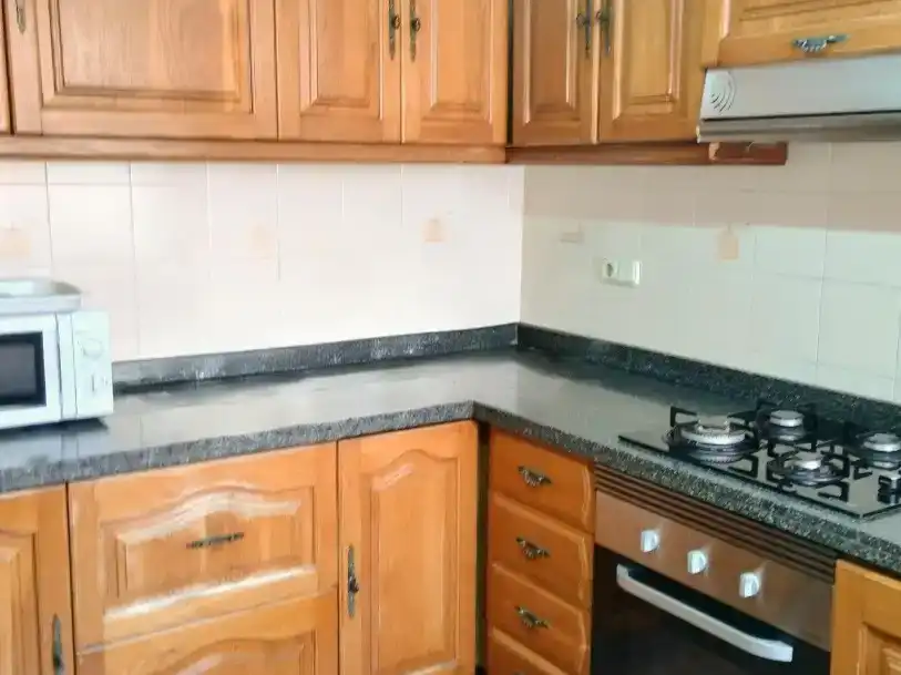 Cuina de Casa adosada en venda en Benidorm amb Aire condicionat i Piscina