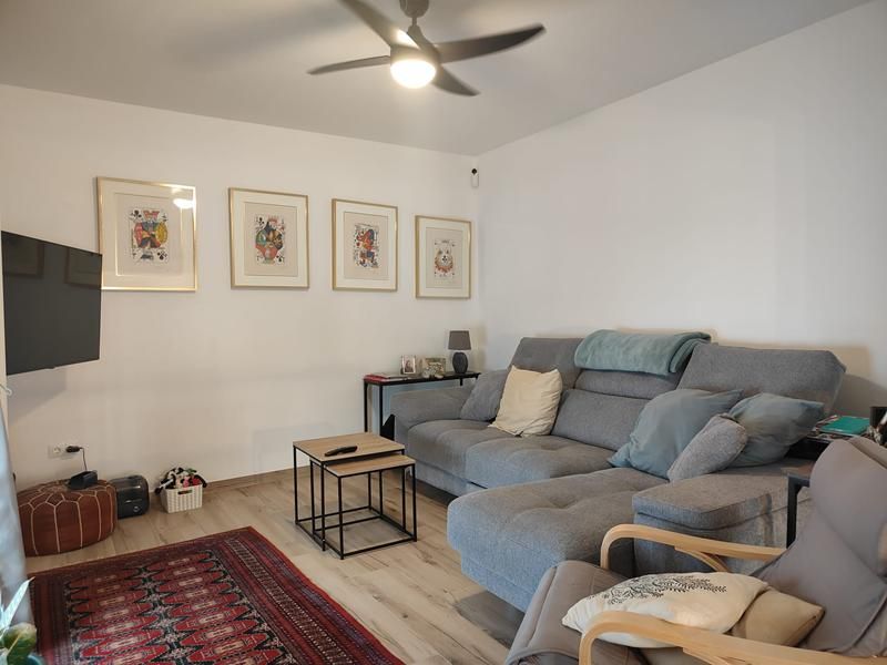 Sala de estar de Casa adosada en venta en Estepona con Aire acondicionado, Calefacción y Terraza