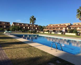 Piscina de Casa adosada en venda en L'Ampolla amb Aire condicionat, Jardí privat i Terrassa