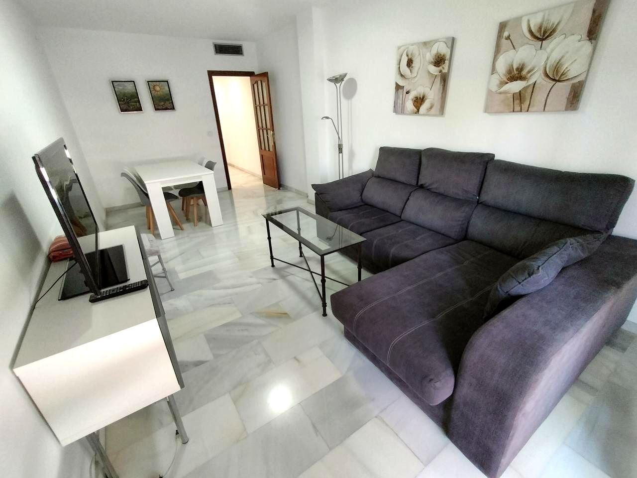 Sala d'estar de Pis de lloguer en  Córdoba Capital amb Aire condicionat, Terrassa i Moblat