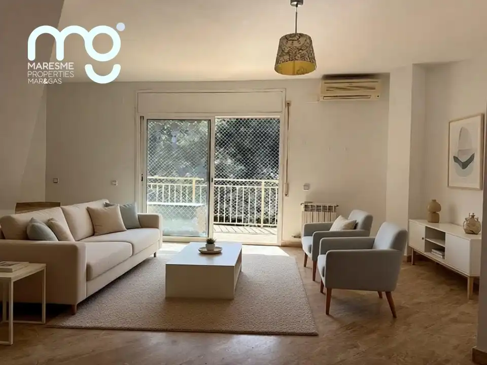 Sala de estar de Dúplex en venta en Canet de Mar con Aire acondicionado, Calefacción y Terraza