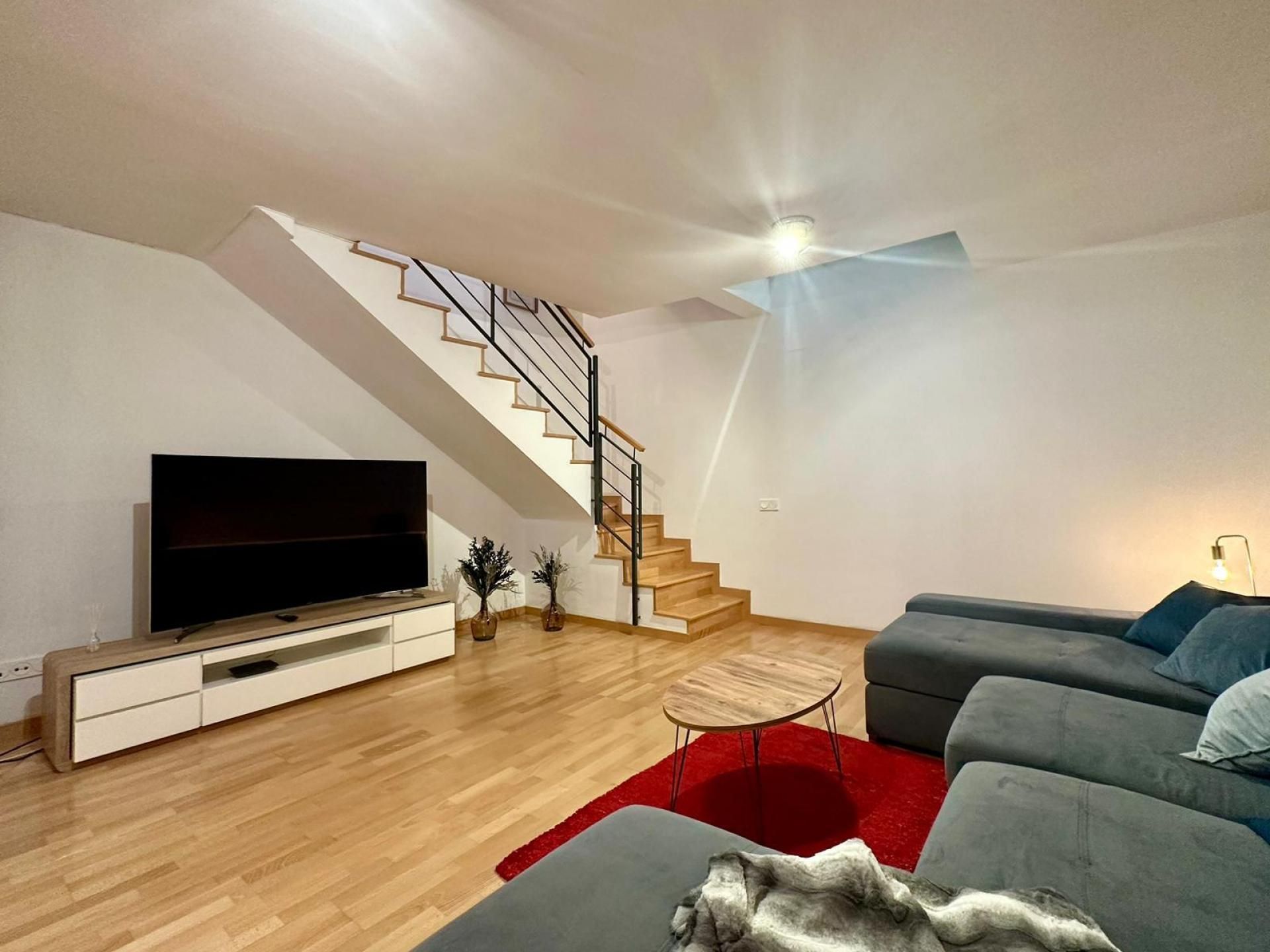 Sala d'estar de Dúplex en venda en  Barcelona Capital amb Aire condicionat, Parquet i Moblat
