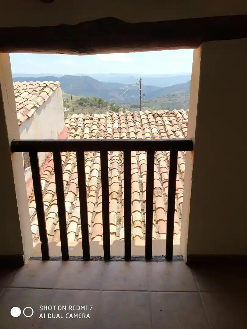 Terrassa de Casa adosada en venda en Castellote amb Parquet, Traster i Moblat
