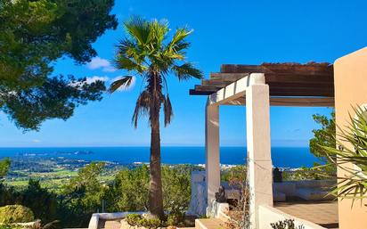 Vista exterior de Casa o xalet en venda en Sant Josep de sa Talaia amb Aire condicionat, Jardí privat i Terrassa