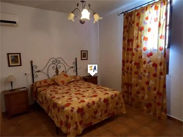 Habitación de Casa adosada en venta en Priego de Córdoba con Aire acondicionado, Terraza y Piscina