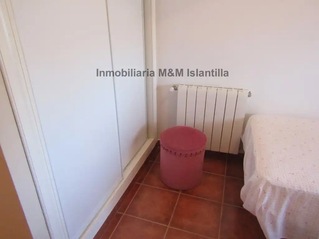 Habitación de Casa adosada en venta en Islantilla con Jardín privado, Terraza y Amueblado