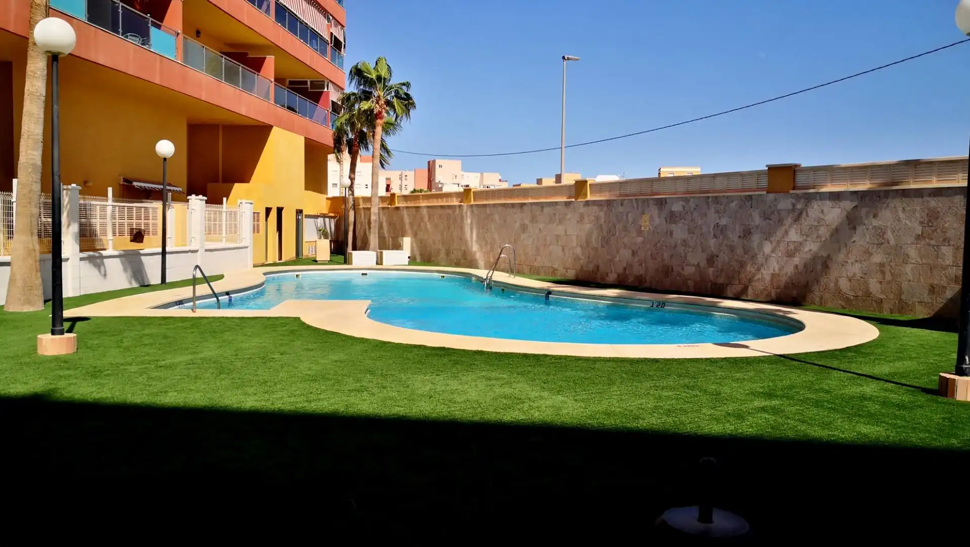 Swimming pool of Flat for sale in Roquetas de Mar  with Air Conditioner, Furnished and Community pool
