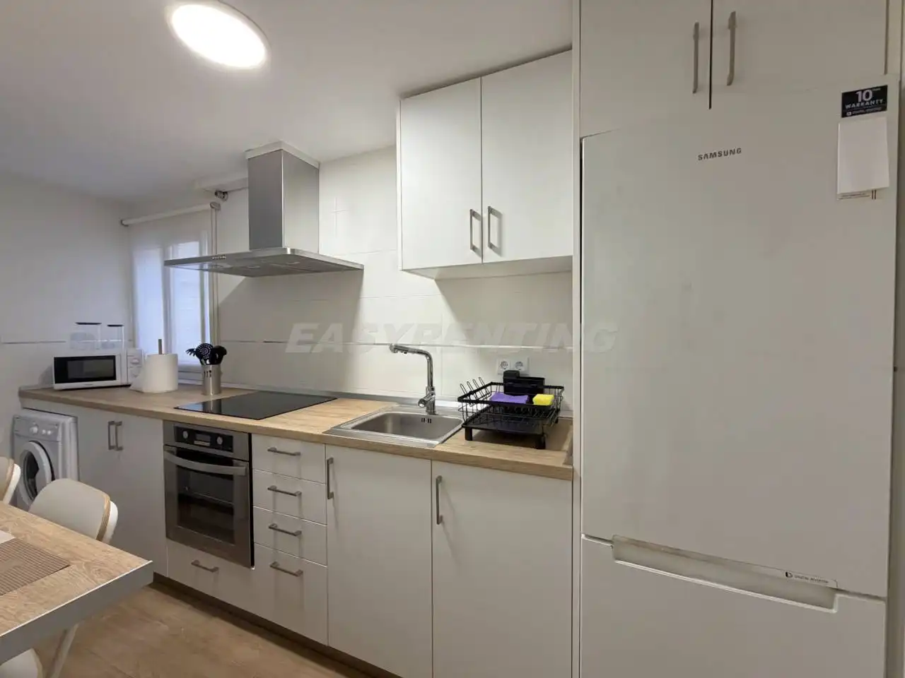 Cuina de Pis de lloguer en La Línea de la Concepción amb Aire condicionat, Terrassa i Moblat