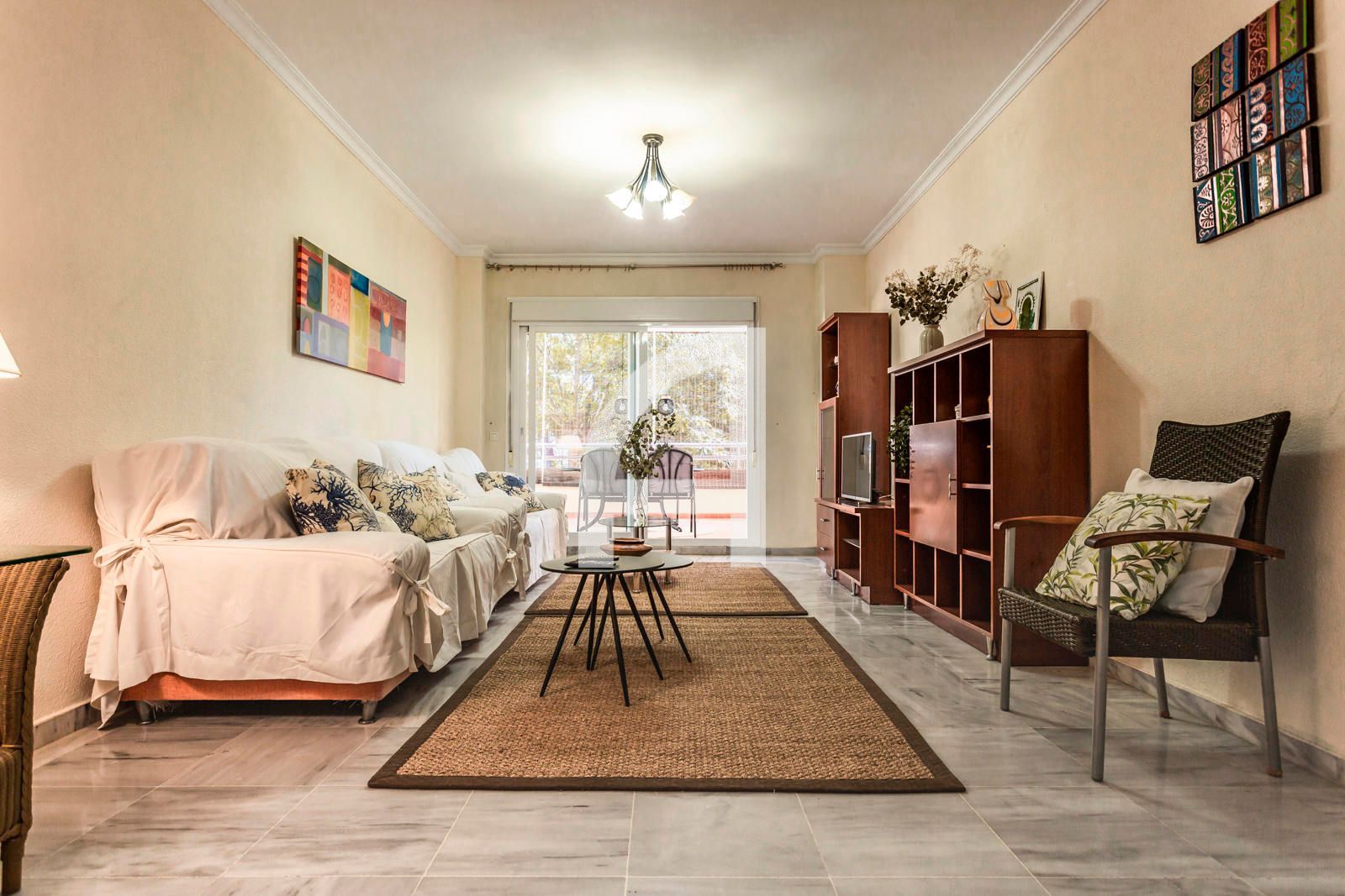 Sala de estar de Piso en venta en Benalmádena con Aire acondicionado, Calefacción y Terraza